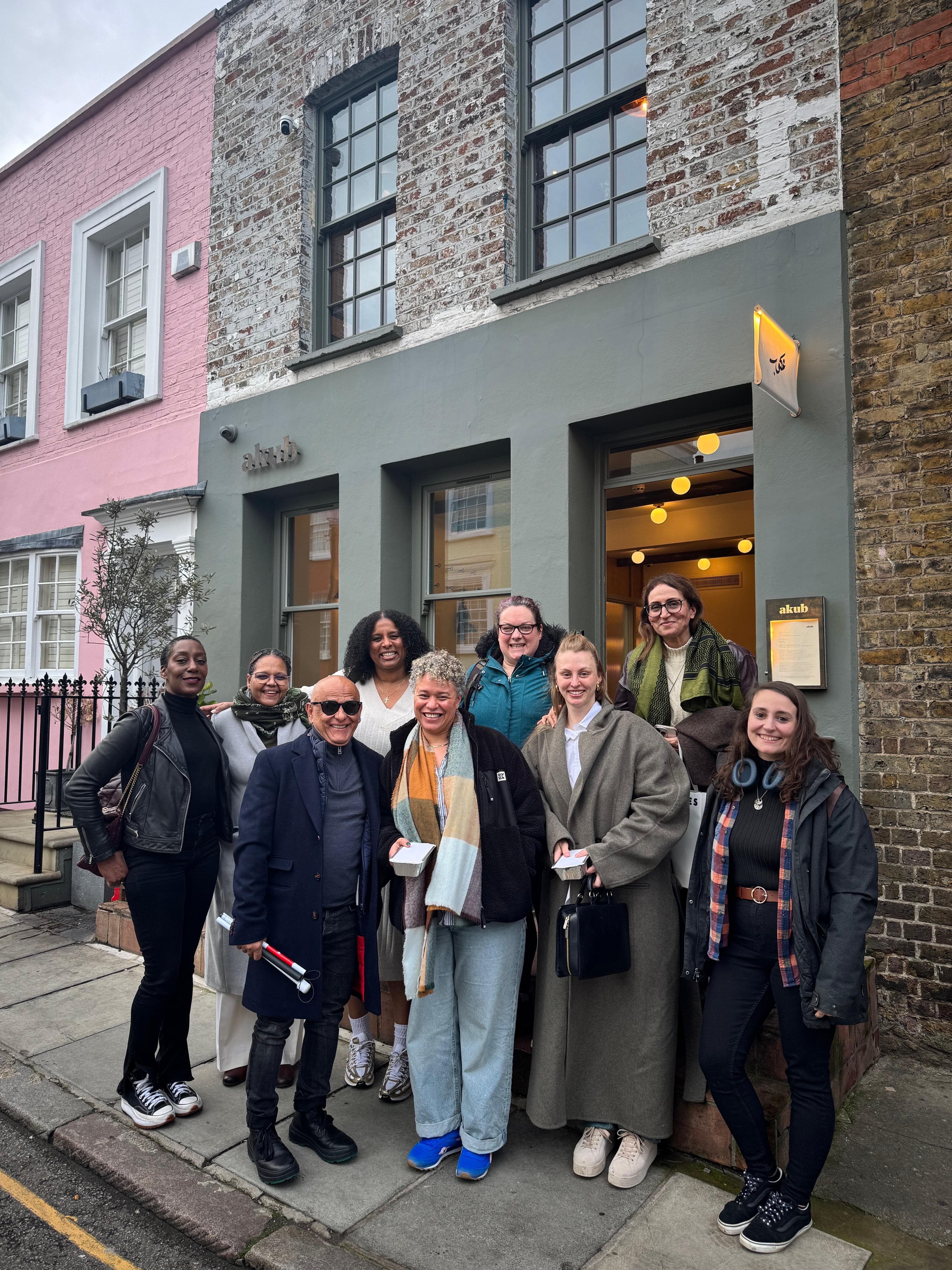 The Headstrong Counselling team outside a restaurant in London